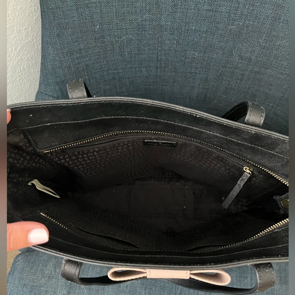 Very very good used condition Kate Spade tote. Black with tan bow detail - Picture 2 of 3